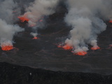 Molten Rock Cools and Forms Plates on the Surface of a Lava Lake