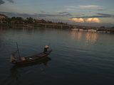 Vietnamese People in a Canoe on the Hoi an River at Daybreak