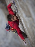 A Climber  Without a Rope  Clings with Fingertips to El Capitan