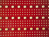 A Graphic Pattern of Gold Dots on a Red Door Found in the City of Xi'An