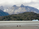 Tourists Visit Lago Grey and Walk across a Spit of Land to an Iceberg
