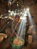 A Woman Makes Injera Bread from a Nutritious Grain