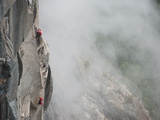 Climbers Ascend El Capitan Using Ropes