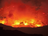Molten Rock Cools and Forms Plates on the Surface of a Lava Lake