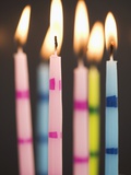 Six Lit Birthday Candles
