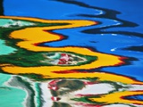 Colors Reflected in Ripples in Canal