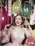 1950s Happy Woman In Party Dress at New Years Eve Celebration