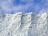 Blue Tabular Iceberg Sculpted by Waves