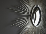 Wall hanging with mirror and rays