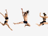 Three dancers jumping