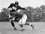 1940s Football Player Being Tackled