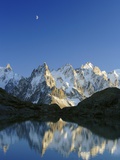 Aiguilles de Chamonix and and Mont Blanc reflected in Lac Blanc at sunset