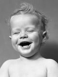 1940s Portrait Baby With Messy Hair Laughing With Eyes Closed