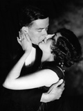 1920s 1930s Romantic Couple Evening Dress Embracing About To Kiss