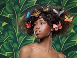 Woman with butterflies in her hair