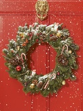 Christmas wreath hanging on a door