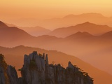 Yellow Mountains silhouetted in haze in China