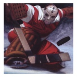Goaltender Stopping a Puck in Hockey