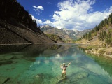 Young Man Fly-fishing on Lower Silver Springs Lake in the Elk Valley Near Fernie  British Columbia 