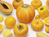 Variety of fruits and vegetables of yellow color