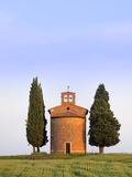 Chapel and cypress trees