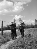 Two Boys with Book Packs Walking to School