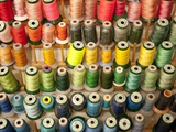 Multi-colored thread in high school sewing class