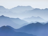 Yellow Mountains silhouetted in haze in China
