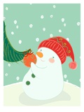 A Snowman Hanging an Ornament on a Tree