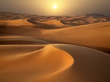 Intense Sun over sand dunes around Dubai