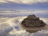 A Sandcastle Being Slowly Washed Away by the Incoming Tide  Cannon Beach  Oregon