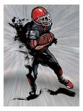 American football player holding football