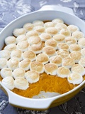 Sweet potatoes with marshmallows in baking dish