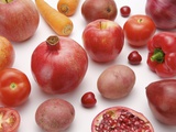 Variety of fruits and vegetables of red color