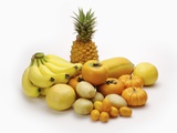 Stack of yellow fruits and vegetables
