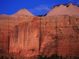 Streaked Wall and Beehives at Sunrise