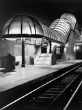 Covered Train Stop Along Tracks
