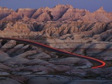 Car Traveling Through Badlands National Park
