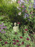 Small Statue in a Back Garden