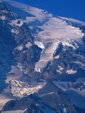 Snow Covered peak of Mount Rainier in the Cascade Mountain Range