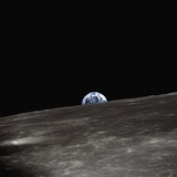 Earth Rising Above the Moon