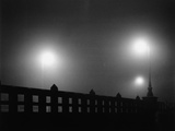 Bridge and Street Lights on a Foggy Night
