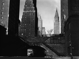 Trolley Car Beneath a Bridge
