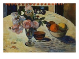 Flowers and a Bowl of Fruit on a Table