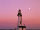 Lighthouse by Beach at Dusk