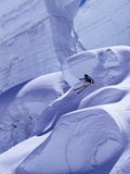 Person Skiing on Glacier in Alps