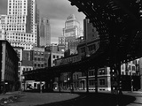 Elevated Rail Curving Beneath Manhattan Buildings