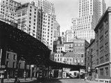 Elevated Rail Curving Beneath Manhattan Buildings