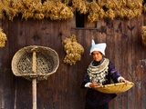 Miao Woman and Drying Produce