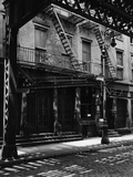 Elevated Train Track Shadows on a Cobblestone Street  Manhattan  1944